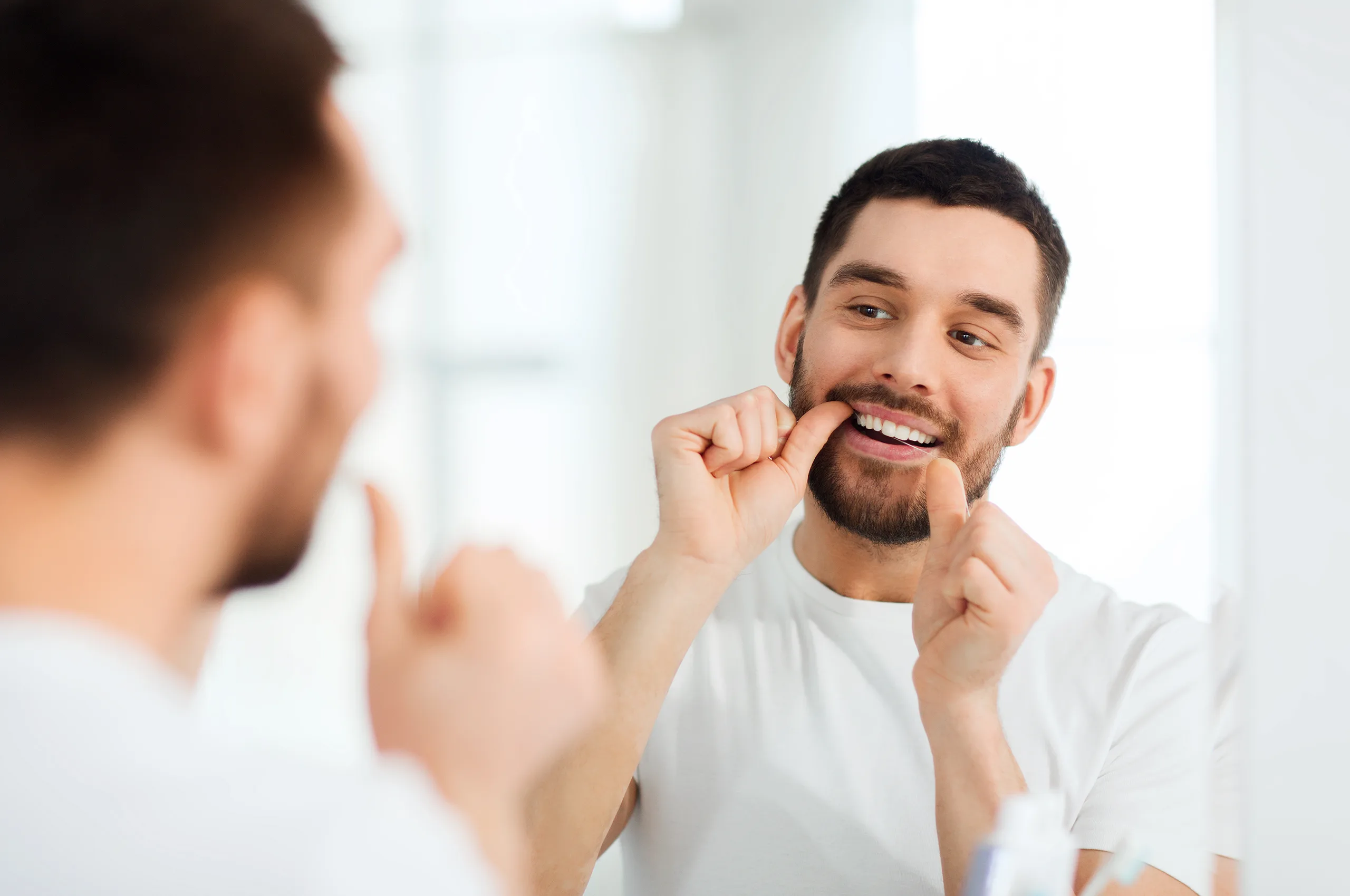 Zubná niť a preventívne prehliadky: Kľúč k zdravému úsmevu